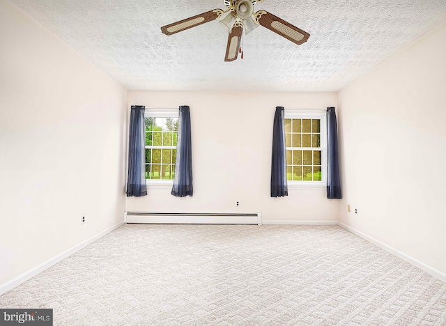 3019 Level Rd, Churchville, MD 21028 - carpeted spare room with a baseboard heating unit, a textured ceiling, a ceiling fan, and baseboards