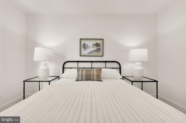 bedroom with baseboards