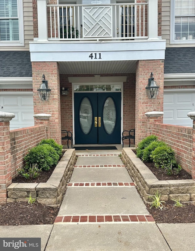 411 Hamlet Club Dr Unit 104, Edgewater, MD 21037 - entrance to property with a balcony, brick siding, and roof with shingles