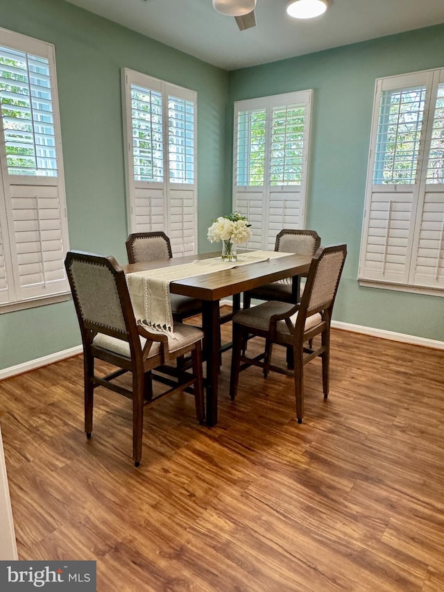 411 Hamlet Club Dr Unit 104, Edgewater, MD 21037 - dining room featuring healthy amount of natural light, light wood-style floors, and baseboards