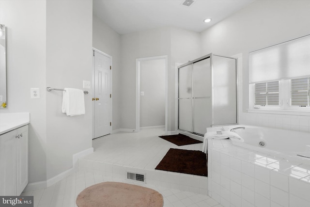 47433 River Crest St, Sterling, VA 20165 - full bath featuring a jetted tub, a shower stall, vanity, tile patterned flooring, and baseboards