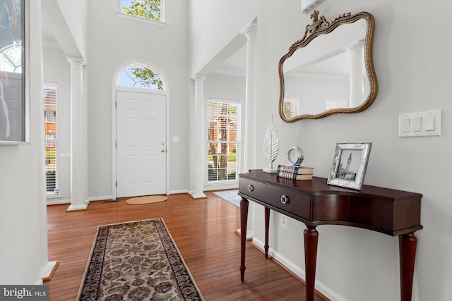47433 River Crest St, Sterling, VA 20165 - entrance foyer featuring decorative columns, wood finished floors, and baseboards