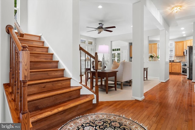 47433 River Crest St, Sterling, VA 20165 - stairway featuring ceiling fan, hardwood / wood-style flooring, baseboards, and recessed lighting
