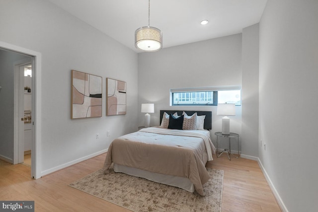 1414 Belmont St NW Unit 207, Washington, DC 20009 - bedroom with light wood-style flooring and baseboards