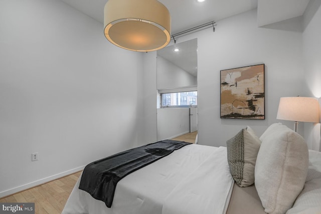 1414 Belmont St NW Unit 207, Washington, DC 20009 - bedroom featuring wood finished floors, recessed lighting, and baseboards