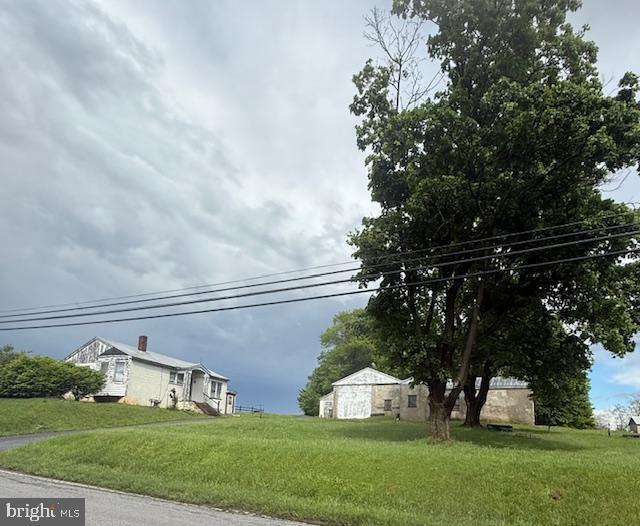 110 N Main St, Union Bridge, MD 21791 - view of side of home with a yard