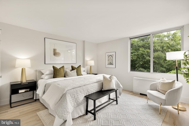 bedroom featuring light wood-type flooring