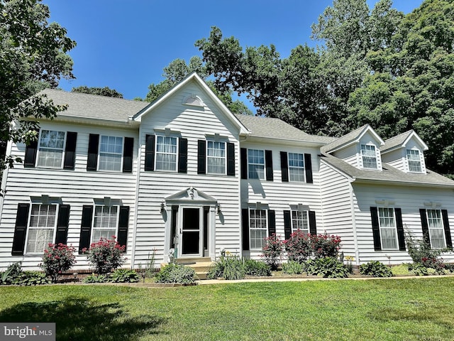 7265 Latham Ct, Hughesville, MD 20637 - colonial-style house featuring a front lawn