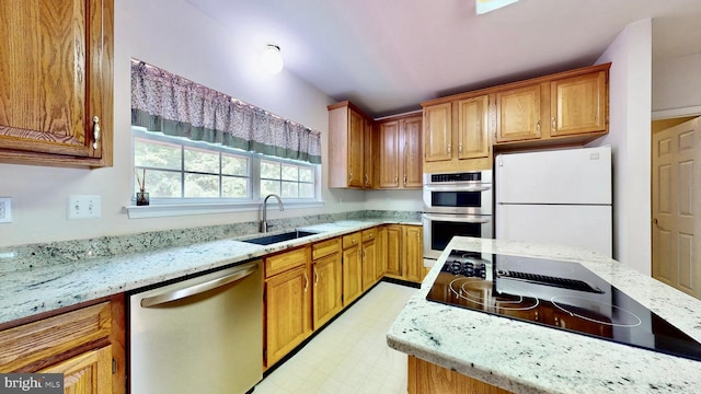 7265 Latham Ct, Hughesville, MD 20637 - kitchen featuring stainless steel appliances, a sink, light stone countertops, and light floors