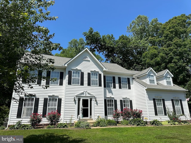 7265 Latham Ct, Hughesville, MD 20637 - colonial home featuring a front yard and a shingled roof