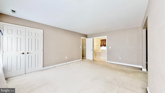 7265 Latham Ct, Hughesville, MD 20637 - unfurnished bedroom featuring baseboards, carpet, ensuite bathroom, and a closet
