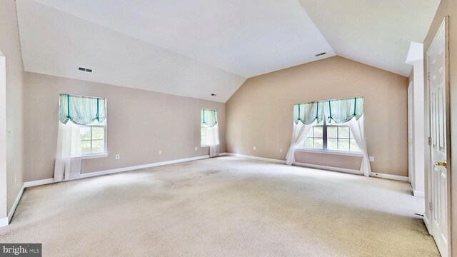 7265 Latham Ct, Hughesville, MD 20637 - unfurnished living room with vaulted ceiling, healthy amount of natural light, carpet floors, and baseboards