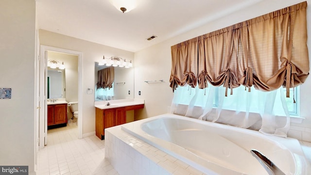 7265 Latham Ct, Hughesville, MD 20637 - bathroom featuring a bath, vanity, tile patterned flooring, and toilet