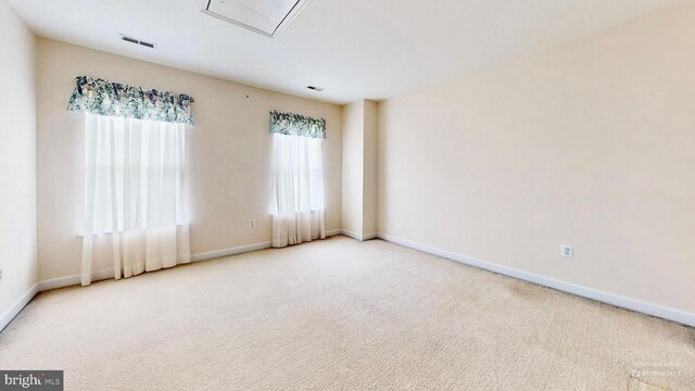 7265 Latham Ct, Hughesville, MD 20637 - carpeted spare room featuring attic access and baseboards