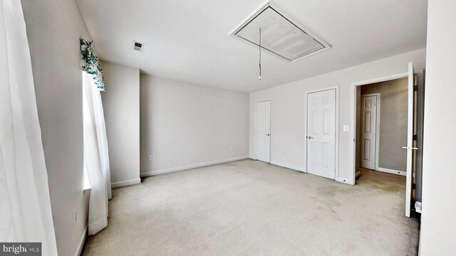 7265 Latham Ct, Hughesville, MD 20637 - unfurnished bedroom with attic access, carpet, and baseboards