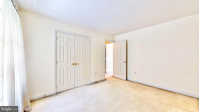 7265 Latham Ct, Hughesville, MD 20637 - unfurnished bedroom featuring carpet floors, baseboards, and a closet