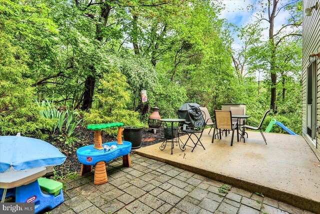 view of patio featuring outdoor dining area and area for grilling