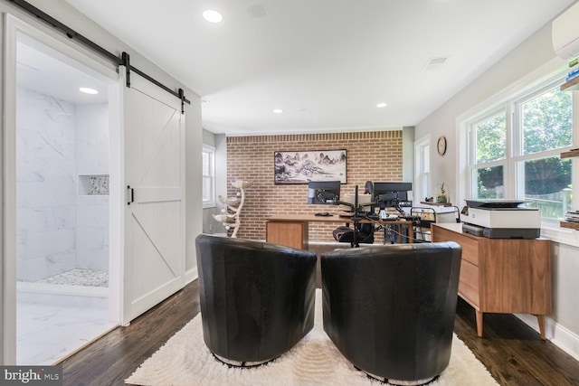 7603 Hammond Ave, Takoma Park, MD 20912 - office area featuring a barn door, dark wood-style flooring, recessed lighting, and brick wall