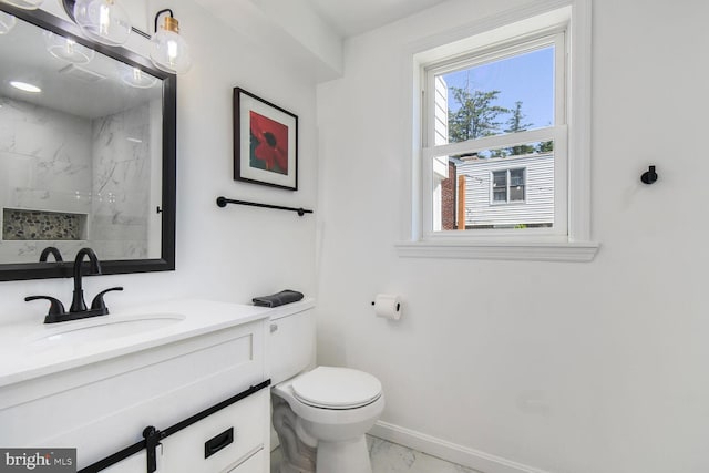 7603 Hammond Ave, Takoma Park, MD 20912 - full bath featuring marble look tile flooring, vanity, toilet, tiled shower, and baseboards