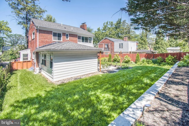 7603 Hammond Ave, Takoma Park, MD 20912 - rear view of property with a chimney, roof with shingles, and brick siding