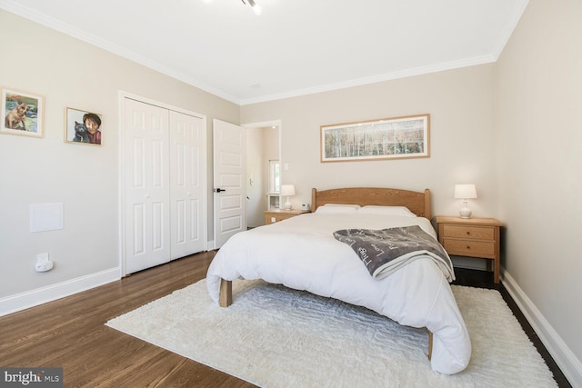 7603 Hammond Ave, Takoma Park, MD 20912 - bedroom featuring wood finished floors, baseboards, ornamental molding, and a closet