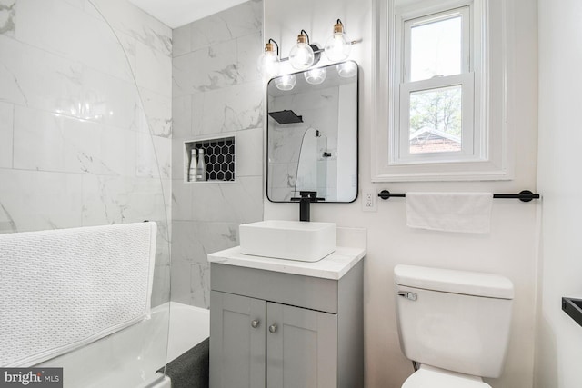 7603 Hammond Ave, Takoma Park, MD 20912 - bathroom featuring vanity, toilet, and washtub / shower combination