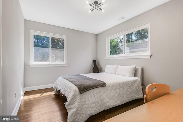 7603 Hammond Ave, Takoma Park, MD 20912 - bedroom featuring baseboards and wood finished floors