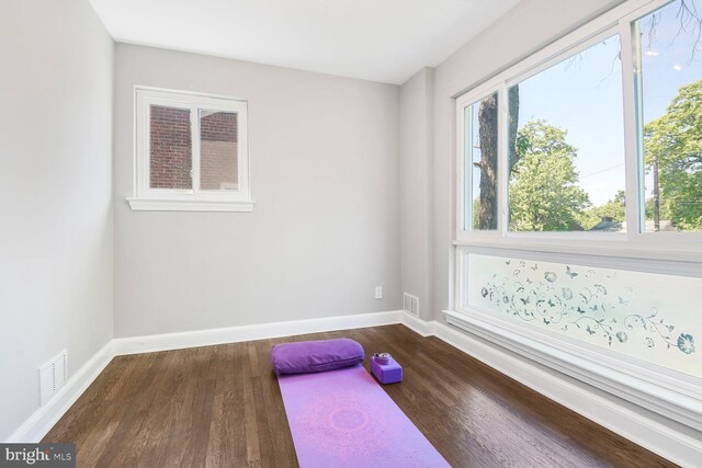7603 Hammond Ave, Takoma Park, MD 20912 - workout area with dark wood-type flooring and baseboards