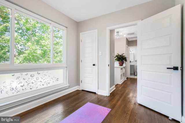 7603 Hammond Ave, Takoma Park, MD 20912 - foyer featuring dark wood-style flooring and baseboards