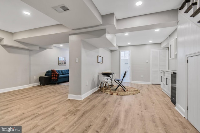 7603 Hammond Ave, Takoma Park, MD 20912 - sitting room featuring light wood finished floors, baseboards, recessed lighting, and beverage cooler