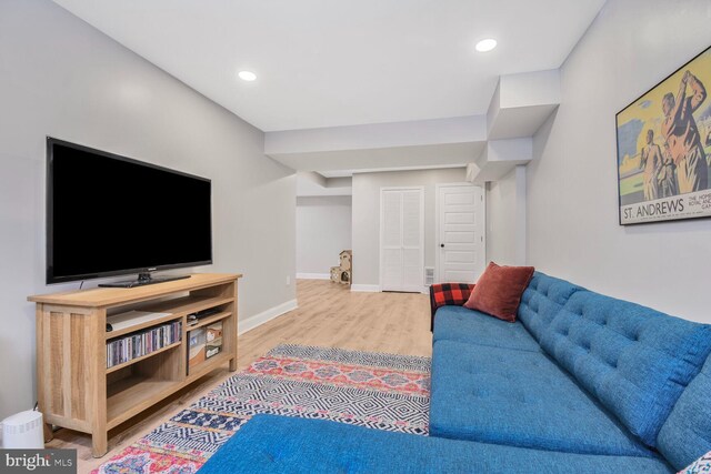 7603 Hammond Ave, Takoma Park, MD 20912 - living area featuring wood finished floors, recessed lighting, and baseboards