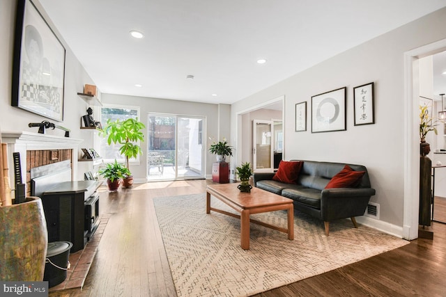 7603 Hammond Ave, Takoma Park, MD 20912 - living room featuring wood finished floors, baseboards, and recessed lighting