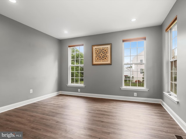 8484 Oak Run Way, Ellicott City, MD 21043 - spare room featuring dark wood-style floors, baseboards, and recessed lighting