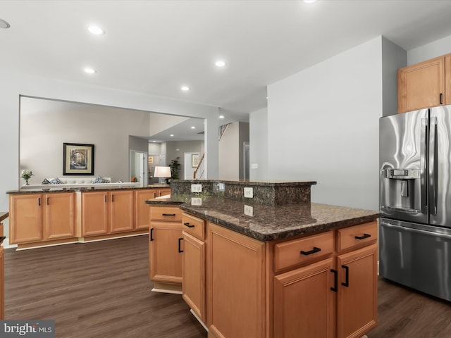 8484 Oak Run Way, Ellicott City, MD 21043 - kitchen with stainless steel refrigerator with ice dispenser, dark wood-type flooring, a kitchen island, dark stone counters, and recessed lighting