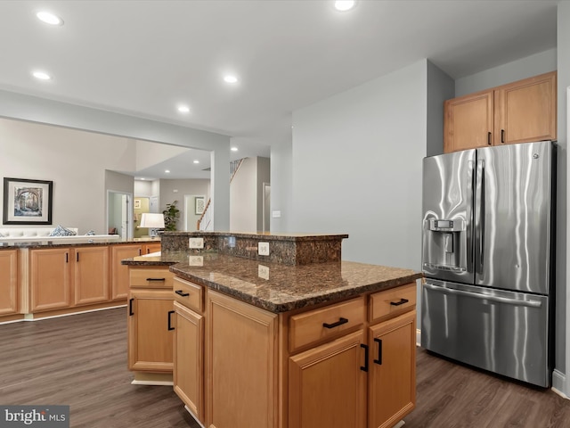 8484 Oak Run Way, Ellicott City, MD 21043 - kitchen featuring stainless steel fridge, dark wood finished floors, light brown cabinets, recessed lighting, and dark stone counters