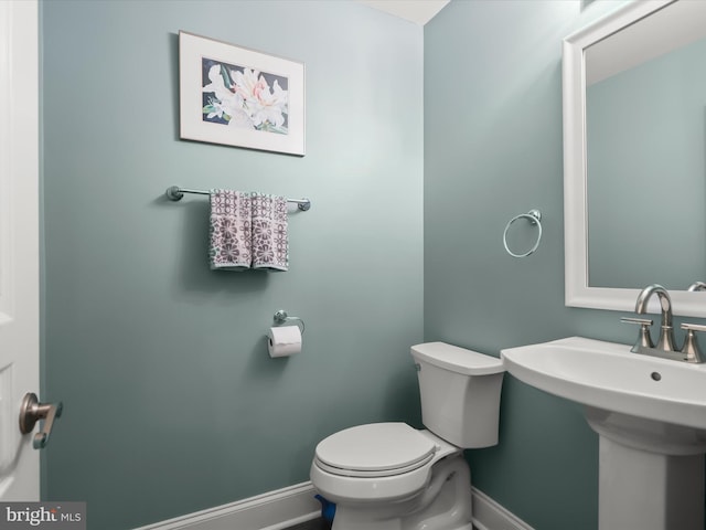 8484 Oak Run Way, Ellicott City, MD 21043 - bathroom with baseboards and toilet