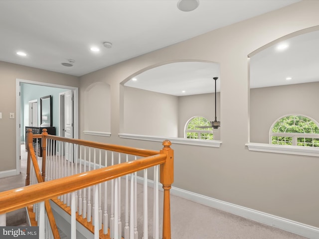 8484 Oak Run Way, Ellicott City, MD 21043 - hallway with baseboards, arched walkways, recessed lighting, and carpet flooring