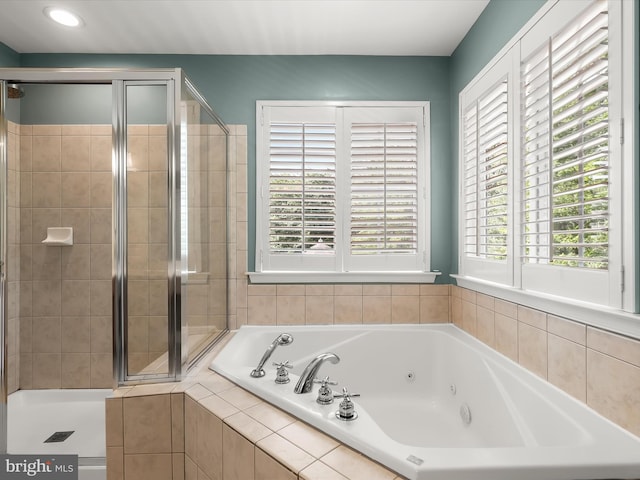 8484 Oak Run Way, Ellicott City, MD 21043 - bathroom featuring a shower stall, a tub with jets, and recessed lighting