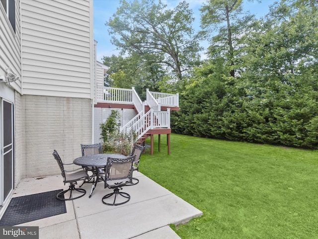 8484 Oak Run Way, Ellicott City, MD 21043 - view of grassy yard with a patio, stairs, and outdoor dining space