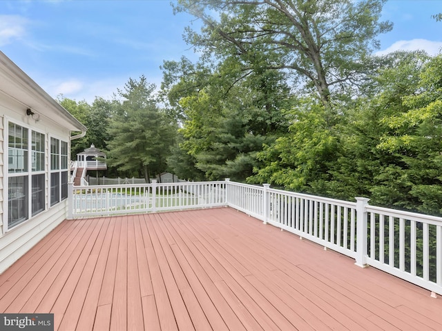 8484 Oak Run Way, Ellicott City, MD 21043 - wooden terrace featuring view of scattered trees