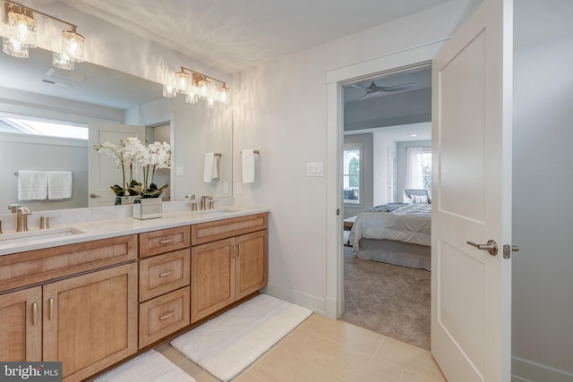 101 Eagle Dr, Broomall, PA 19008 - full bath with healthy amount of natural light, connected bathroom, double vanity, and a ceiling fan