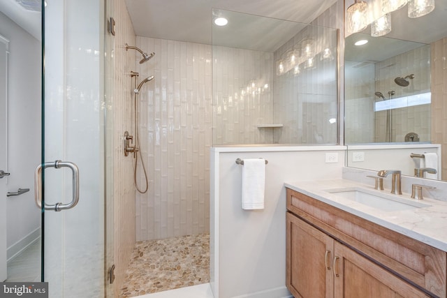 101 Eagle Dr, Broomall, PA 19008 - bathroom featuring a shower stall, vanity, and baseboards