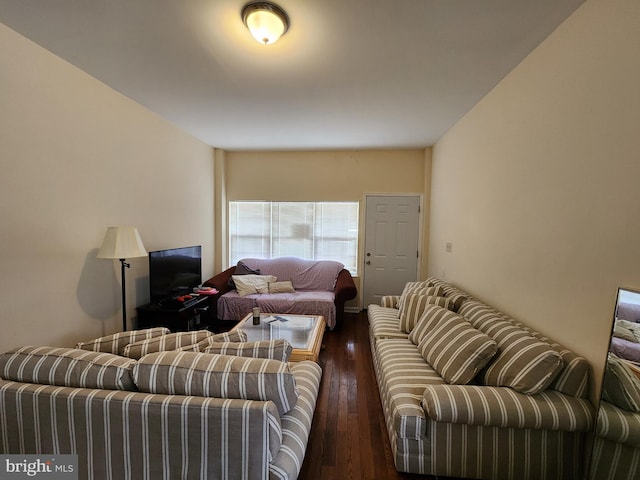 living room featuring dark wood-style flooring