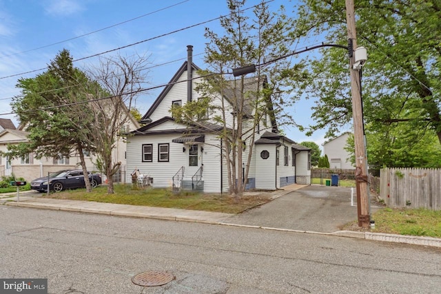 97 Church St, Thorofare, NJ 08086 - view of front of home with fence and asphalt driveway