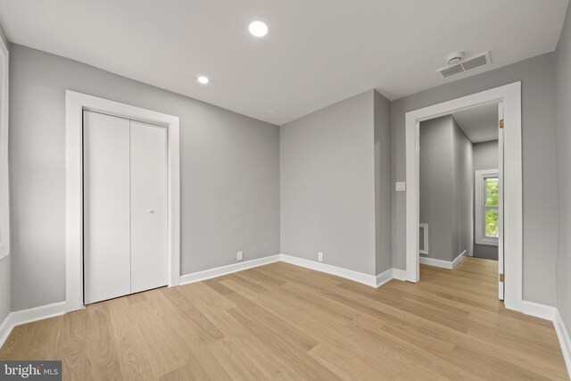 97 Church St, Thorofare, NJ 08086 - unfurnished bedroom featuring light wood-style flooring, baseboards, recessed lighting, and a closet