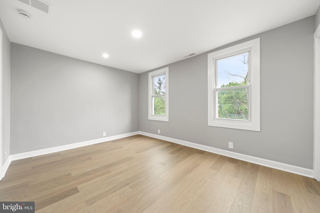 97 Church St, Thorofare, NJ 08086 - spare room featuring baseboards, light wood-style floors, recessed lighting, and a smoke detector