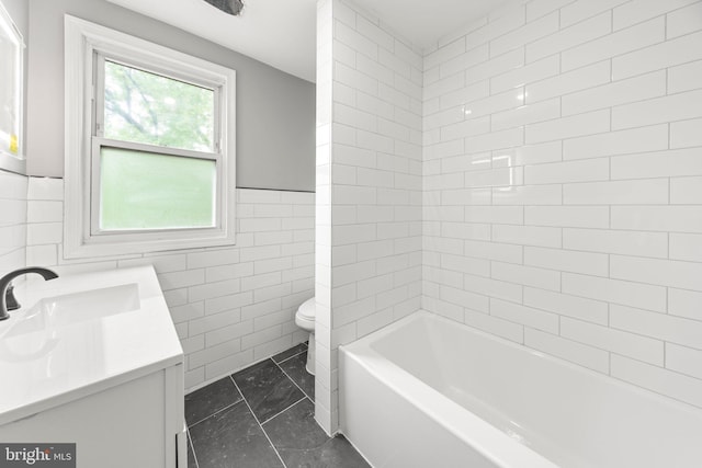 97 Church St, Thorofare, NJ 08086 - bathroom featuring toilet, tile walls, and vanity