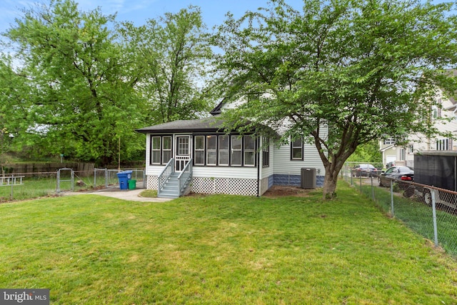 97 Church St, Thorofare, NJ 08086 - rear view of property featuring a sunroom and central AC unit