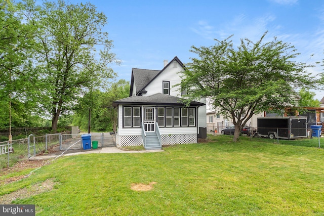 97 Church St, Thorofare, NJ 08086 - rear view of property featuring a gate, a sunroom, a shingled roof, a chimney, and central AC