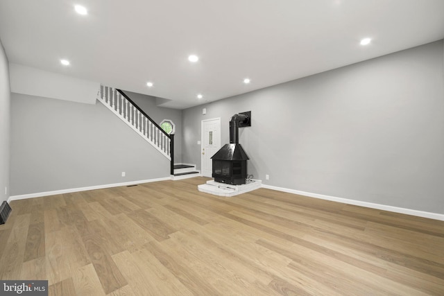 97 Church St, Thorofare, NJ 08086 - unfurnished living room with stairs, baseboards, light wood-style floors, and recessed lighting